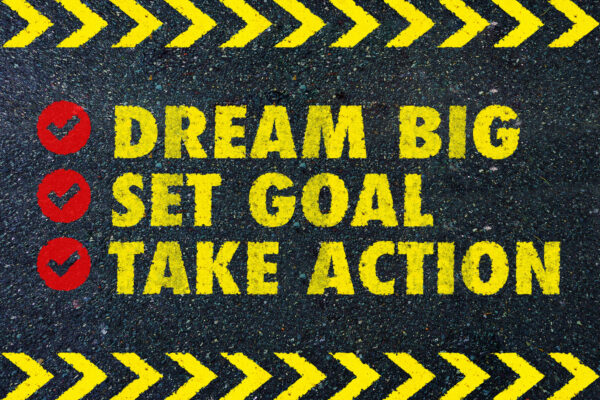 Dream big set goal take action word on road