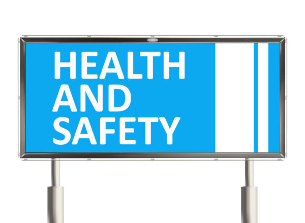 Health and safety. Road sign on the white background. Raster illustration.