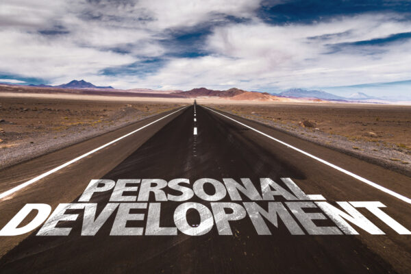 Personal Development written on desert road